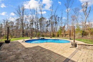 Backyard swimming pool, hot tub, hardscaping, fire pit, dining space, screened porch!