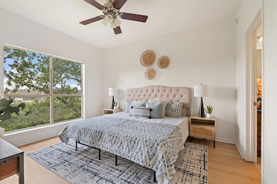 Bedroom featuring light wood-style flooring, ceil