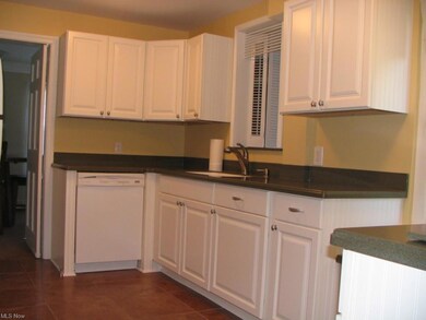 Remodeled Kitchen with newer Cabinets & Corian Cou