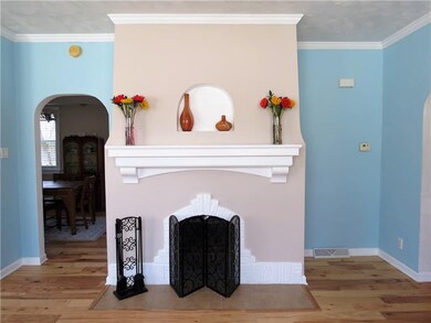 STUNNING WOOD BURNING FIREPLACE IN THE LIVING ROOM