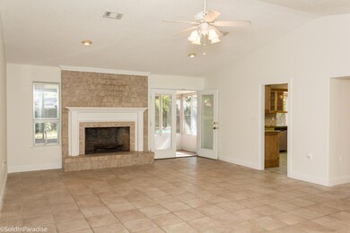 French doors lead to the sunroom.