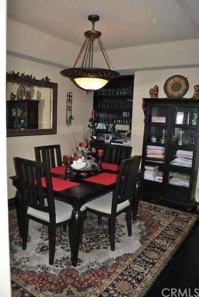 Spacious Dining room with built in shelving area. 