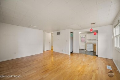 Living room looking into kitchen