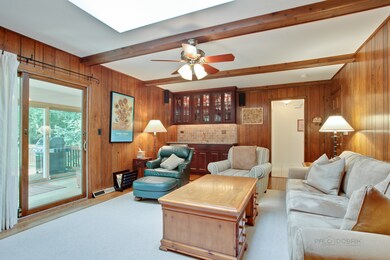 Family room with hardwood flooring and access to y