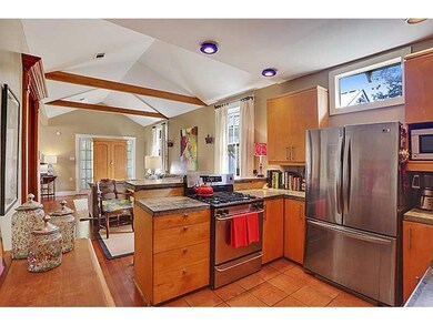 Kitchen. Handsome concrete counter tops, with stai