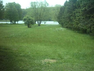 View Front yard down to lake front
