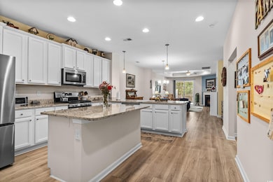 Kitchen with appliances with stainless steel finis