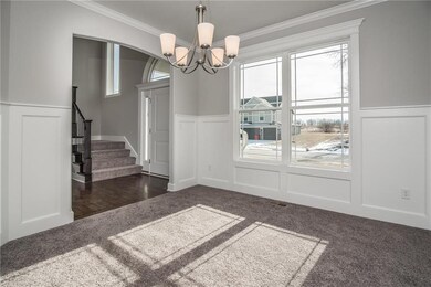 View from flex room to entrance and stairway