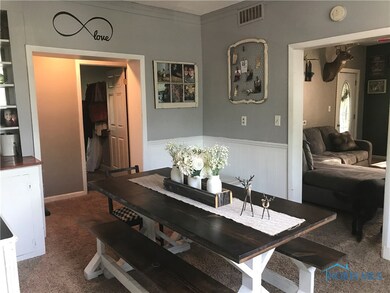 Dining room showing access to living room and hall