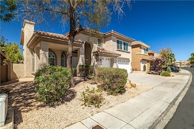 Mediterranean / spanish house featuring driveway,