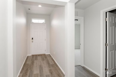 Doorway with wood finished floors