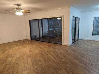 Living room leading to enclosed porth