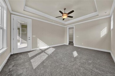 Standard Master Bedroom w/door to patio (tray ceil