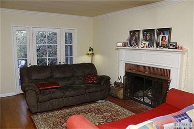 Hardwood floors, wood burning fireplace and french
