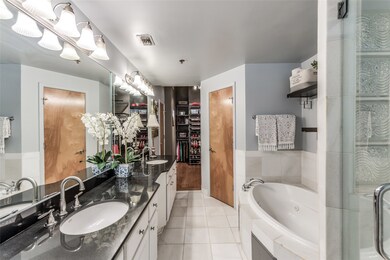 Master bathroom with huge walk-in shower. Door on