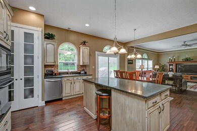 The open floor plan allows you to make a meal and 
