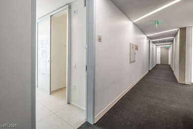 Hall featuring baseboards