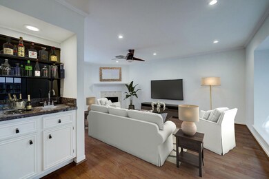 Wet Bar overlooking Living Area. Virtually Staged
