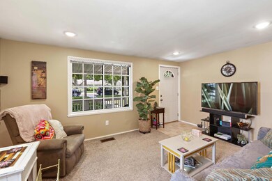 Living room looking towards front door.