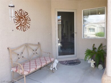 Covered Porch. Storm Door Entry.