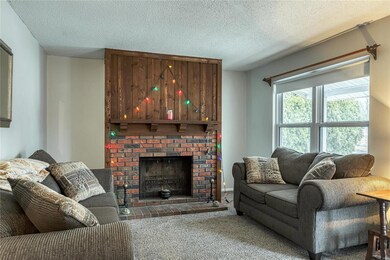 Family room with newer carpet.