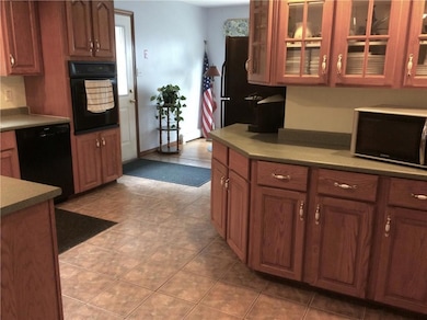 Kitchen extends to one side where...
