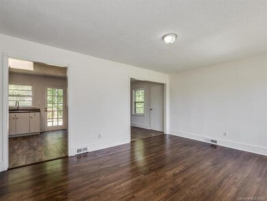 Living Room has a great flow to Kitchen and Dining