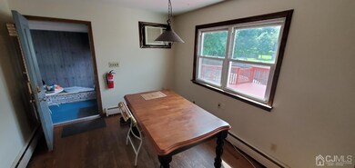 1st Floor apartment dining area off kitchen, door to breezway.