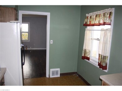 Kitchen opens to Living room. Cozy eating space in