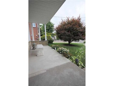 Facade/Exterior Front. Items on porch stay