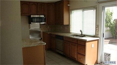 Granite counters and lovely wood cabinets