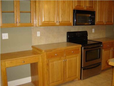 Kitchen view w/built-in desk