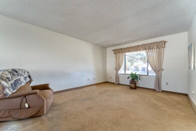 Sunken Living Room with Huge Window and view of fr