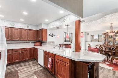 Updated kitchen with glass/marble countertops, rec