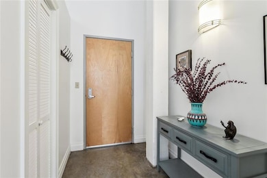 Looking back to the front door, there is a spaciou