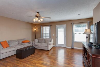 The living room opens out onto the enclosed patio.
