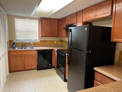 Roomy kitchen with tons of cabinets and counter to