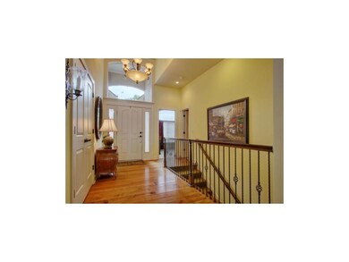 Vaulted entry with lots of natural light.
