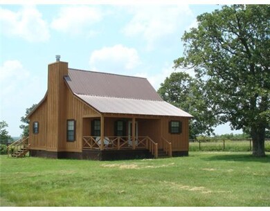 Exterior Front. Cedar Ranch house located @ ranch