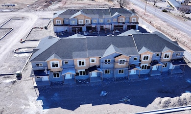 Birds eye view of property with a residential view