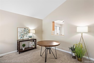 Dining area has snack bar to the kitchen