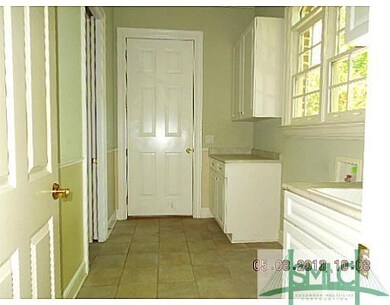 Other. Laundry room with deep sink, half bath and 