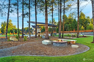 Explore all the Park has to offer with lush green spaces and no grass to mow! Enjoy carefree evenings by the gas firepits, savoring barbeques with neighbors. Little ones will delight in the expansive play area, while furry friends frolic in the fenced dog park.