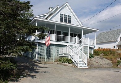 Large covered porch, with a screened...