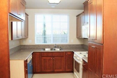 Kitchen with granite countertops and custom cabine