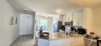 1330 Derbyshire Ct unit 203, Naples, FL 34116 - photo 7