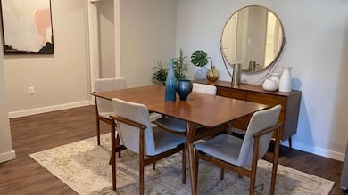 Dining room featuring dark hardwood / wood-style f