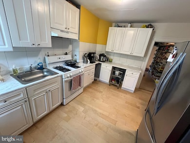 713 E 23rd St, Baltimore, MD 21218 - photo 7