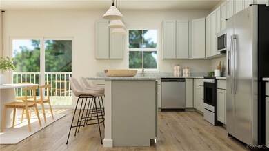 Kitchen with appliances with stainless steel finis