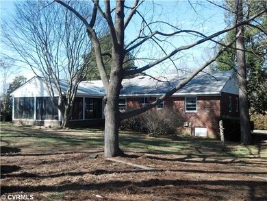 Exterior Back - HUGE SUNROOM